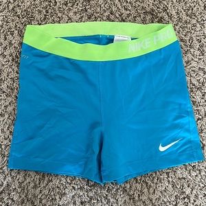 Nike pro teal and neon green L